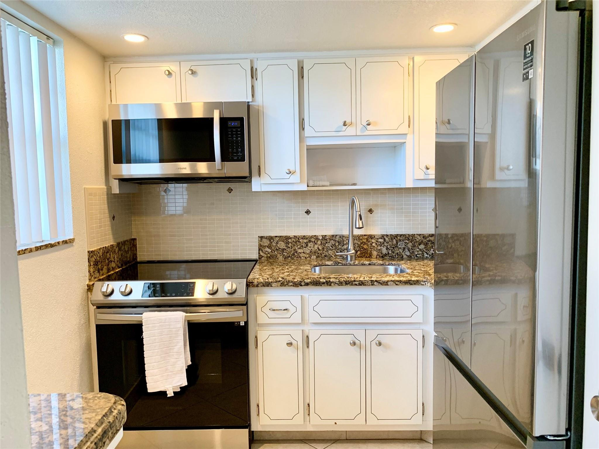 Foto de propiedad en 6550 Winfield Boulevard 105, Margate, FL 33063 Margate con MLS# 