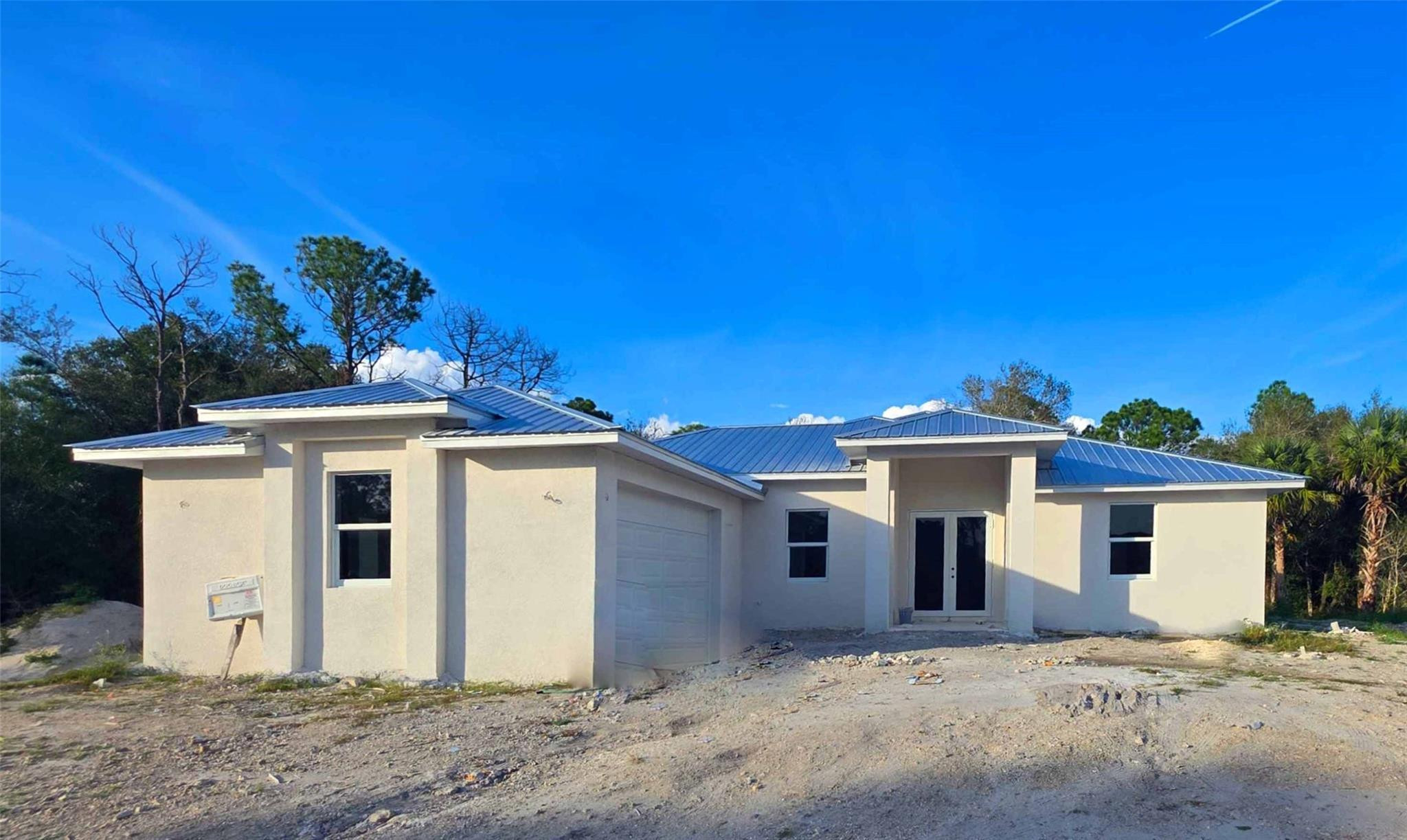 Foto de propiedad en 133 Hunting Club Avenue, Clewiston, FL 33440 Clewiston con MLS# 
