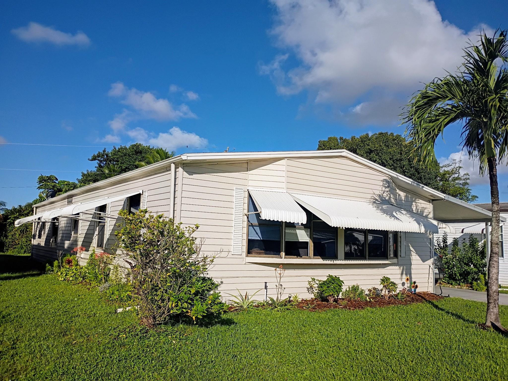 Foto de propiedad en 3353 Lake Overlook Place, Lantana, FL 33462 Lantana con MLS# 