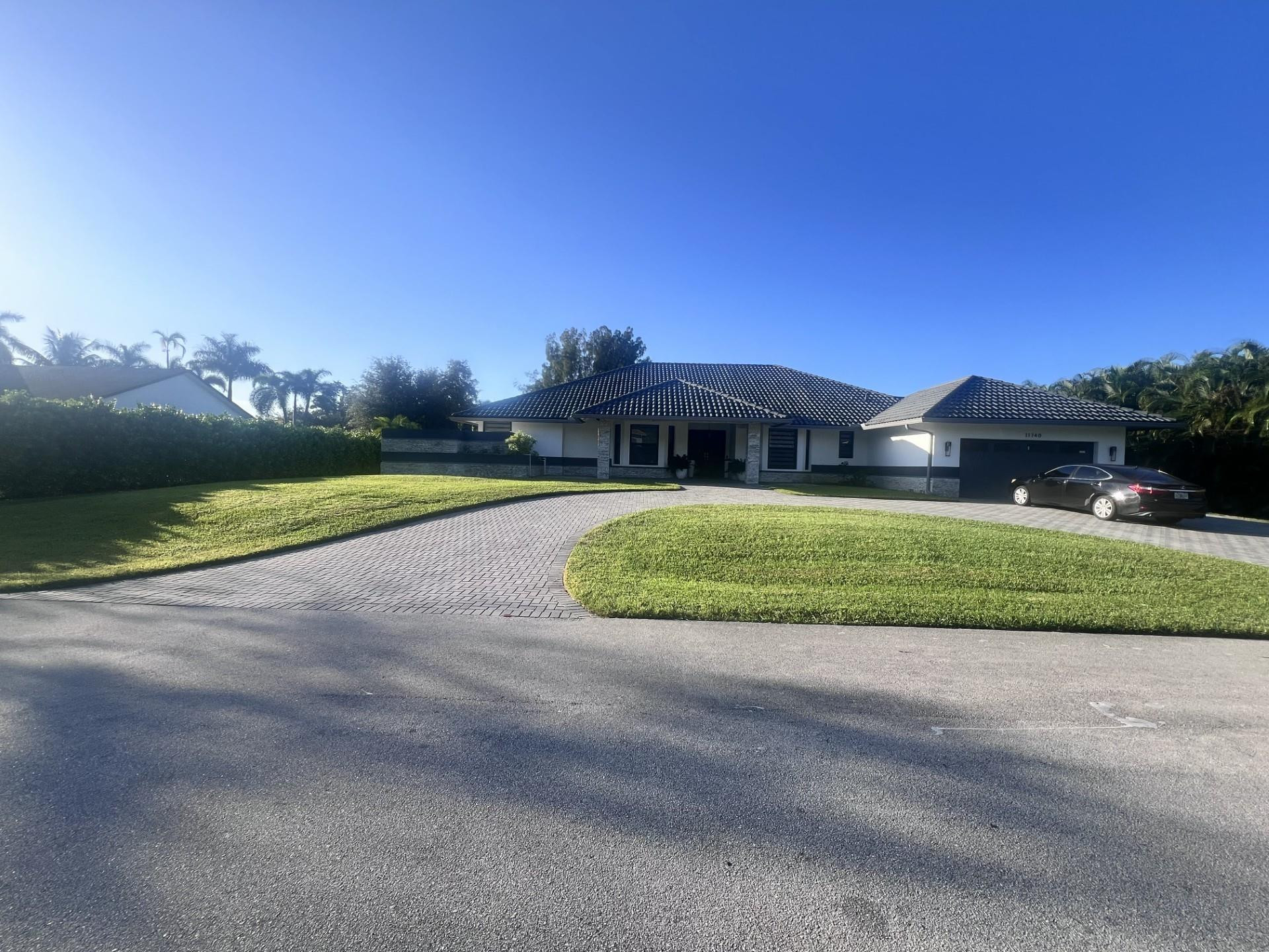 Foto de propiedad en 11740 Hermitage Drive, Plantation, FL 33325 Plantation con MLS# 