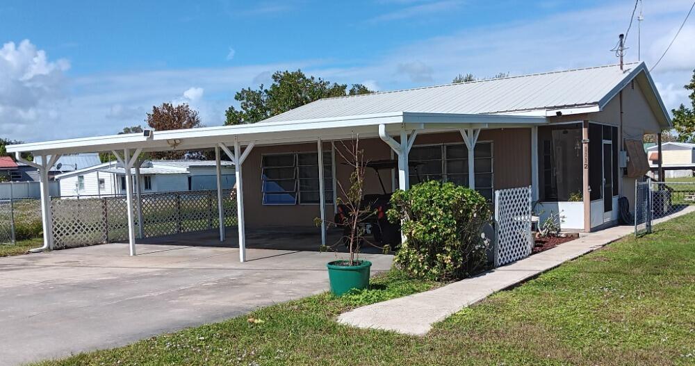Foto de propiedad en 1112 21st Street, Okeechobee, FL 34974 Okeechobee con MLS# 
