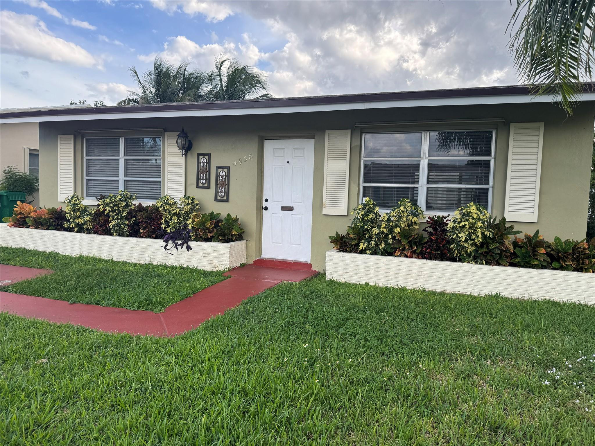Foto de propiedad en 4938 NW 54TH Court, Tamarac, FL 33319 Tamarac con MLS# 