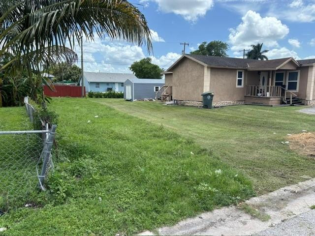 Foto de propiedad en 525 SW 9th Street, Belle Glade, FL 33430 Belle Glade con MLS# 