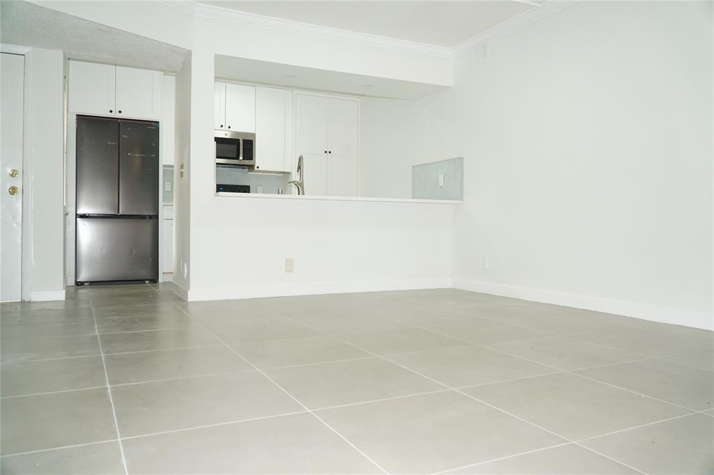 Foto de propiedad en 11574 NW 44th Street 11574, Coral Springs, FL 33065 Coral Springs con MLS# 