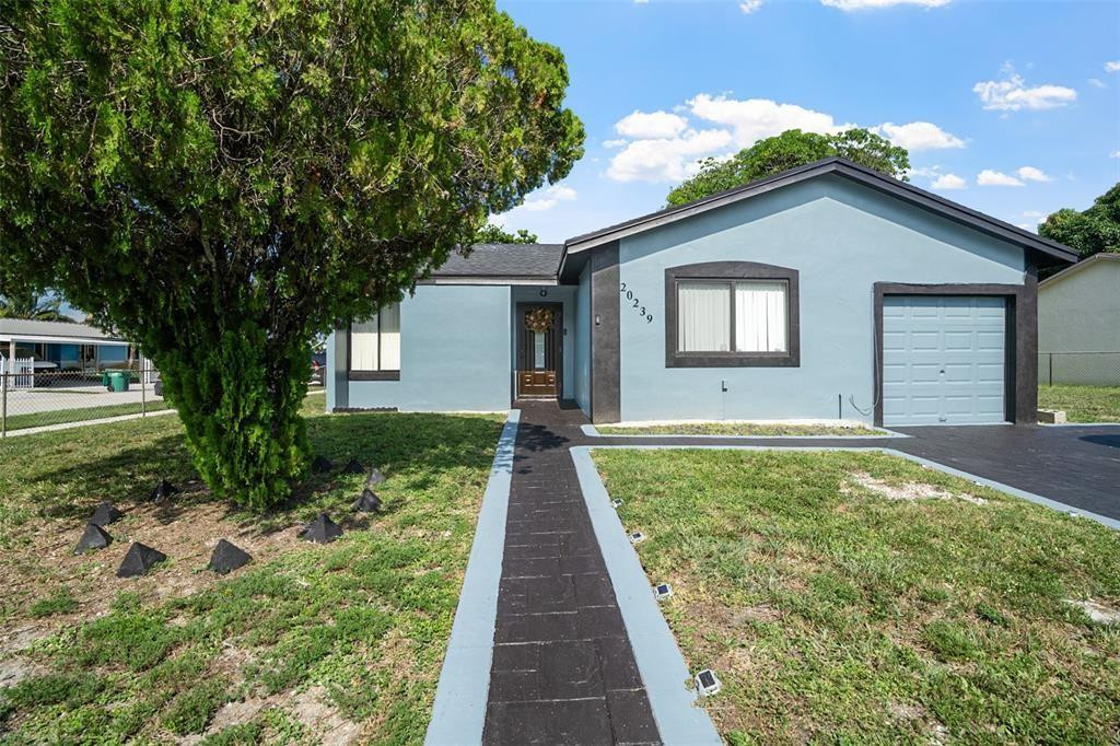 Foto de propiedad en 20239 NW 33rd Court, Miami Gardens, FL 33056 Miami Gardens con MLS# 