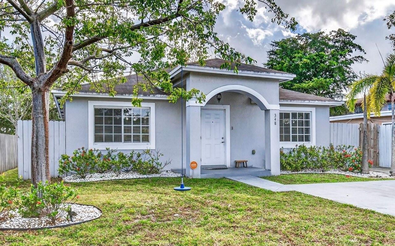 Foto de propiedad en 348 NW 40th Court, Oakland Park, FL 33309 Oakland Park con MLS# 
