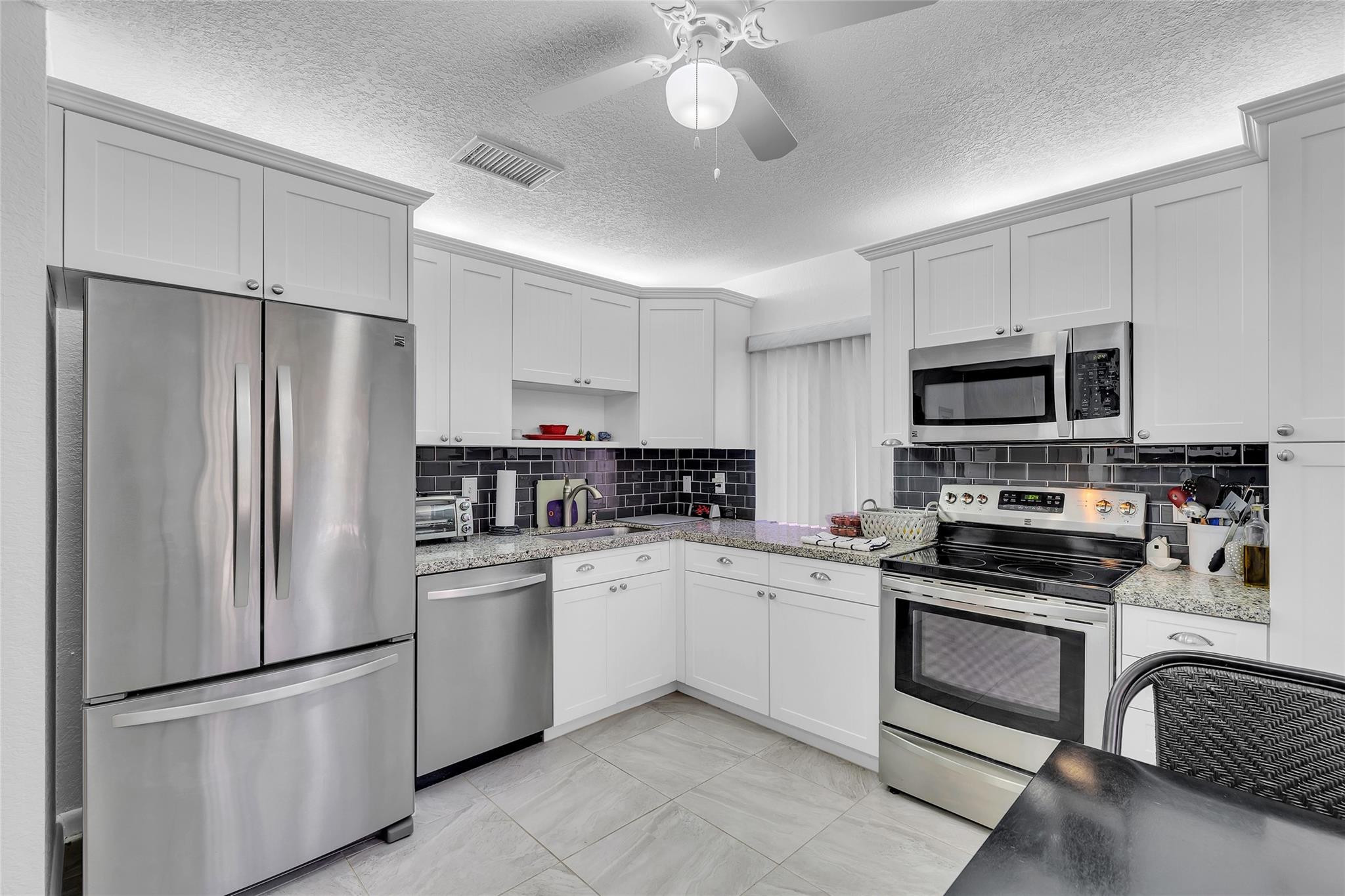 Foto de propiedad en 2260 Seagrape Circle, Coconut Creek, FL 33066 Coconut Creek con MLS# 