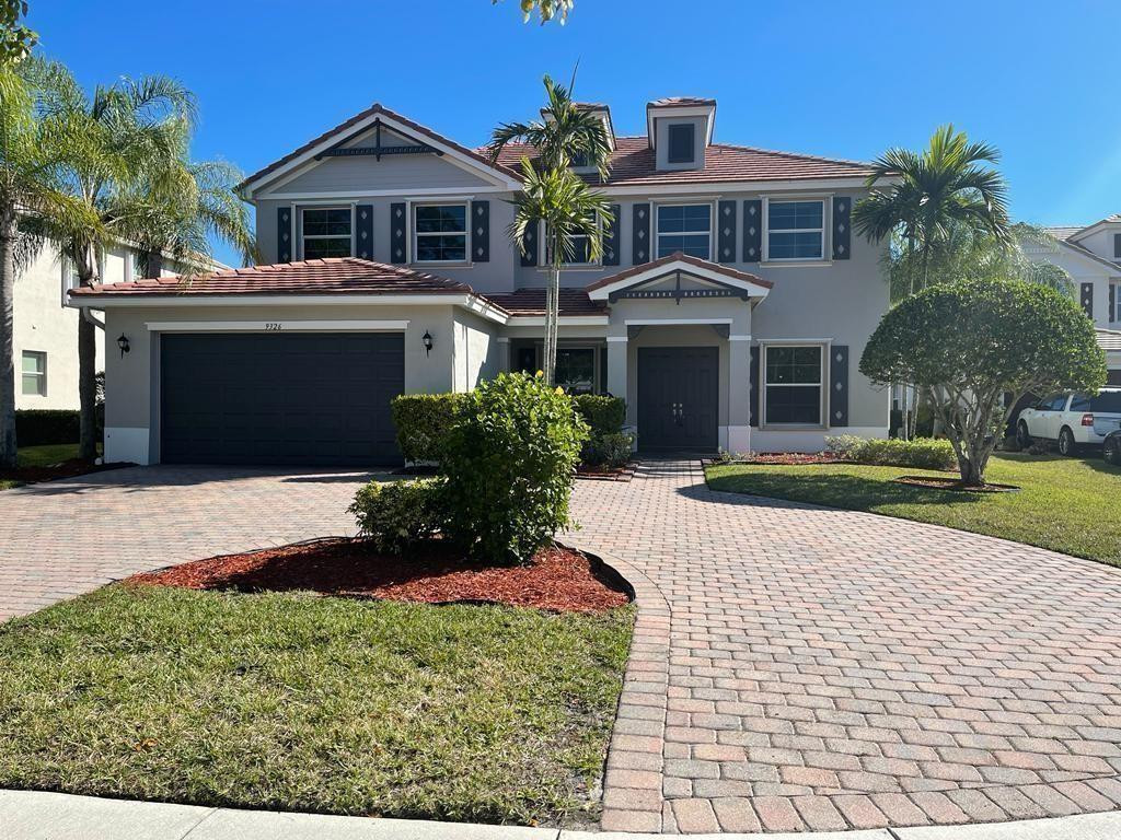Foto de propiedad en 9326 Plantation Estates Drive, Royal Palm Beach, FL 33411 Royal Palm Beach con MLS# 