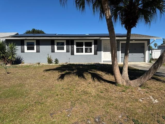 Foto de propiedad en 321 NE Genesee Avenue, Port St. Lucie, FL 34983 Port St. Lucie con MLS# 