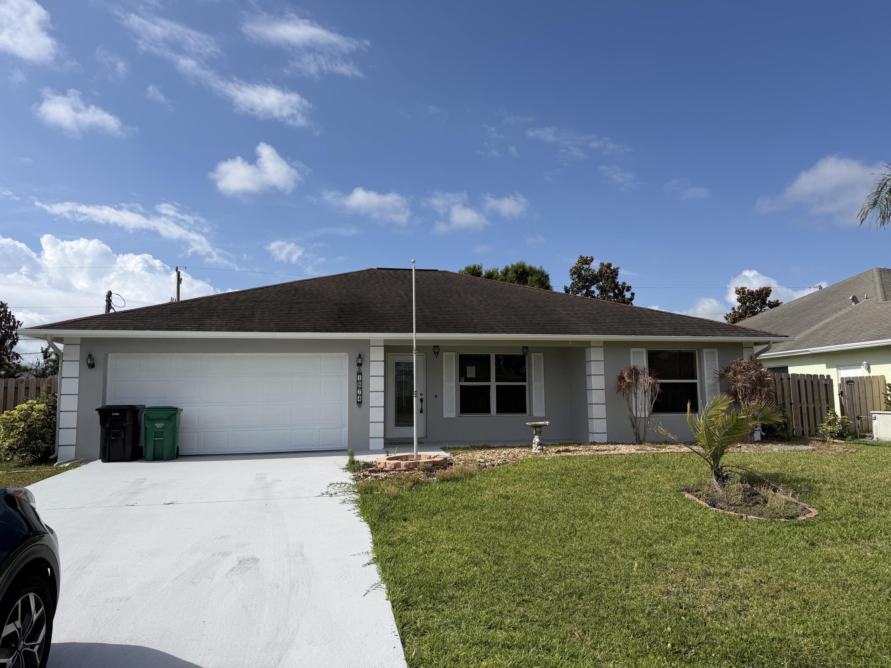 Foto de propiedad en 1874 SW Capehart Avenue, Port St. Lucie, FL 34953 Port St. Lucie con MLS# 