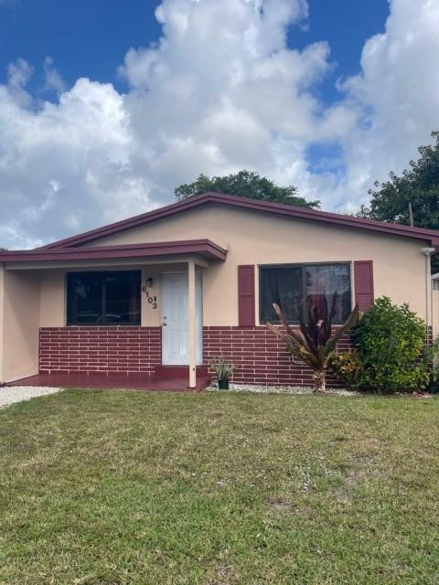 Foto de propiedad en 6103 Fletcher Street, Hollywood, FL 33023 Hollywood con MLS# 