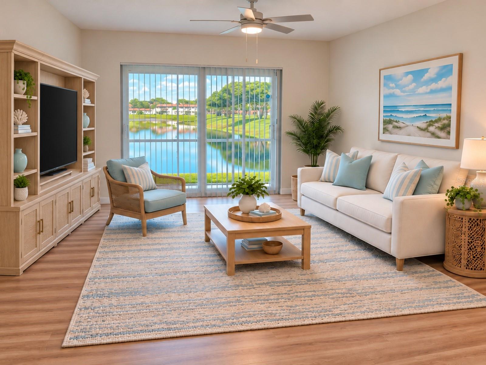 Living room with screened patio and water view. Virtually staged