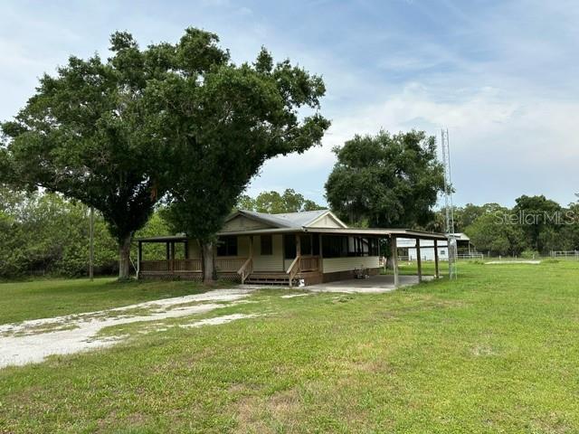 Foto de propiedad en 6976 NW 151ST TER OKEECHOBEE con MLS# O6207176
