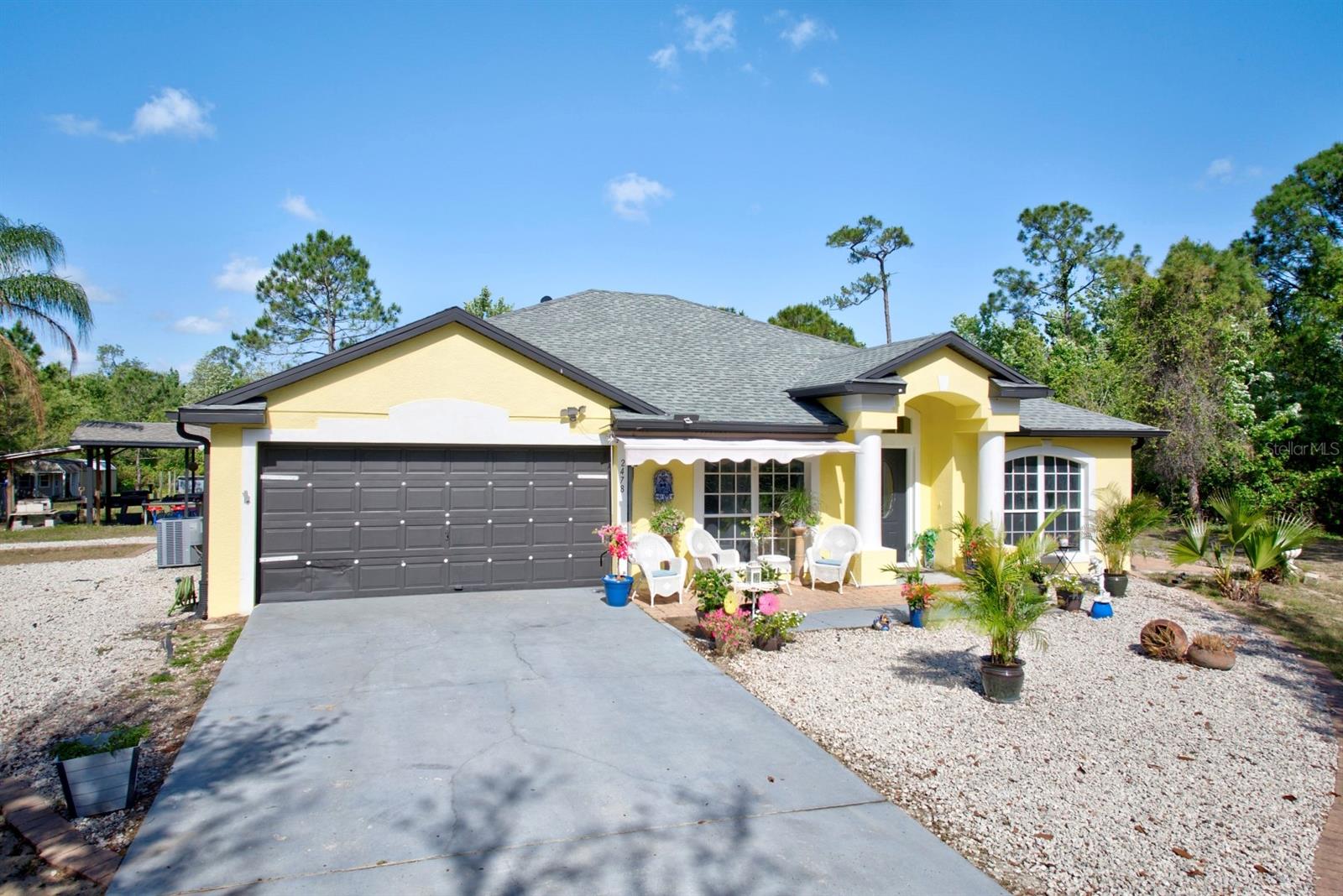Foto de propiedad en 2478 THACKER TRL KISSIMMEE con MLS# O6301945