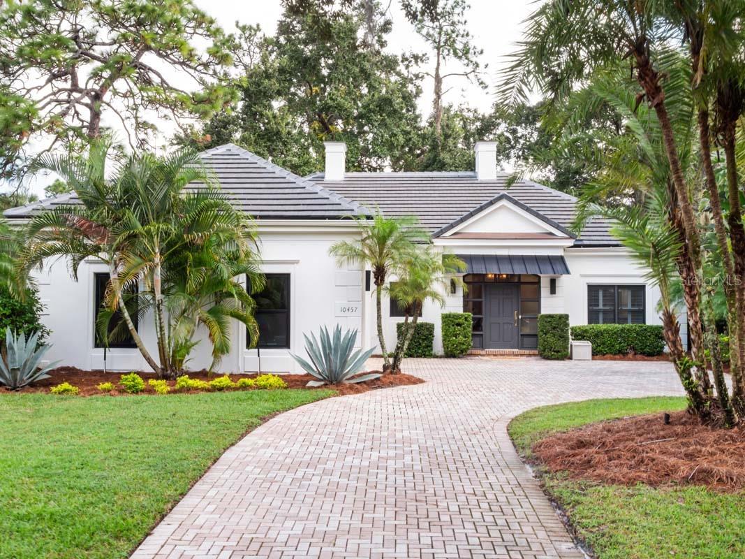 Foto de propiedad en 10457 CROMWELL GROVE TER ORLANDO con MLS# O6345910