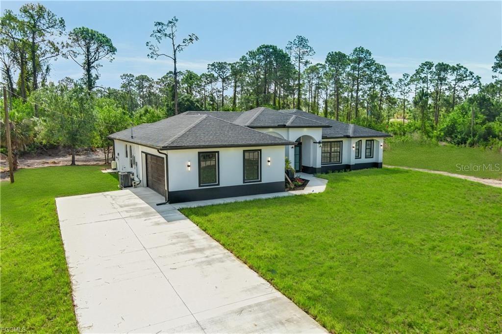 En Venta 1506 8TH AVE, LEHIGH ACRES, FL 33972
