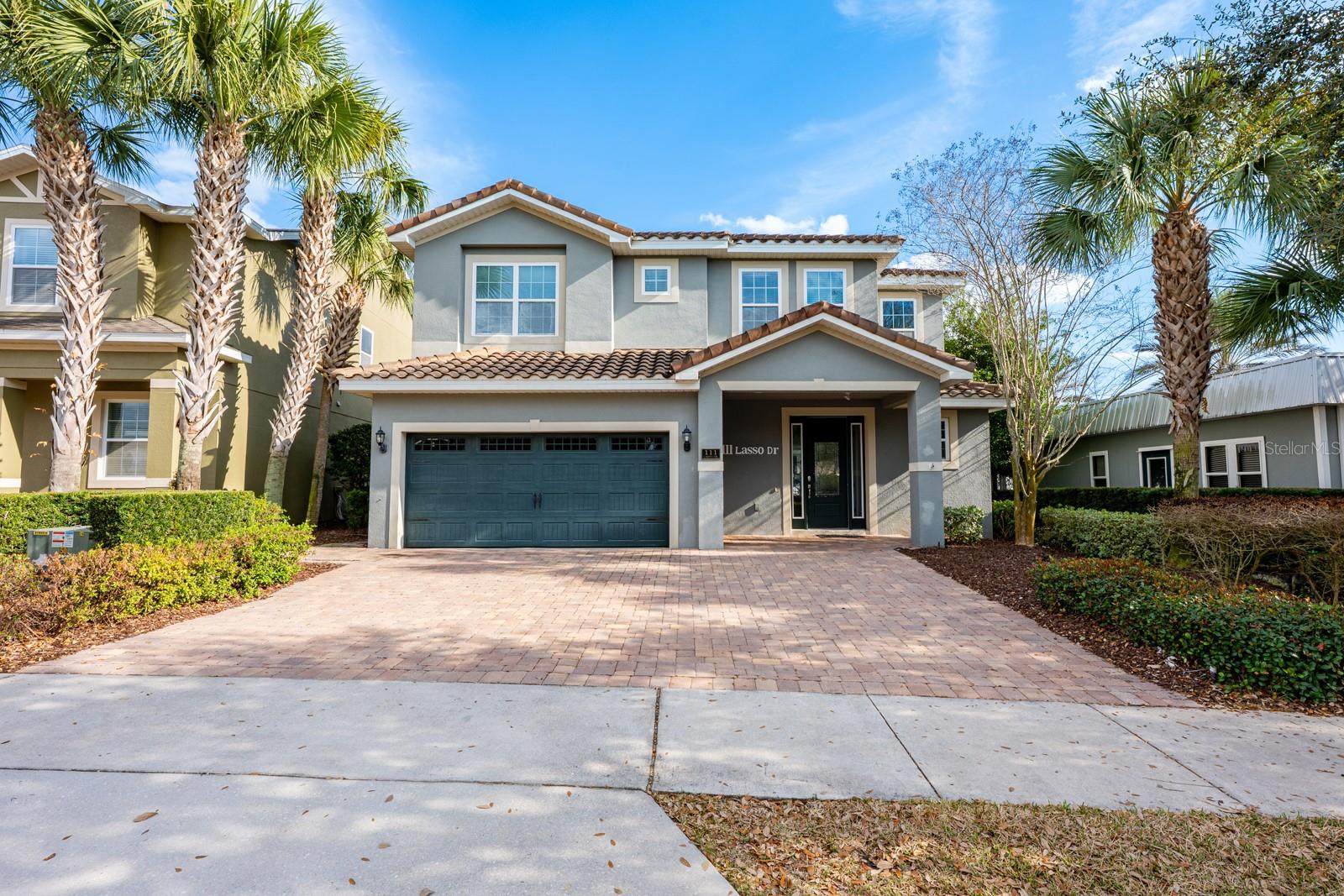 Welcome to an EXTRAORDINARY LUXURY RETREAT in the distinguished Reunion West community where elegance, scale, and unforgettable experiences come together in one spectacular 4,500-SQUARE-FOOT vacation estate.
