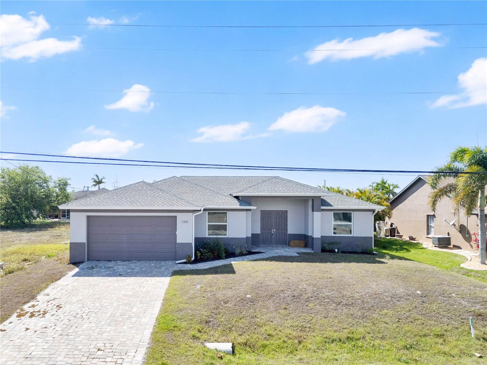 Foto de propiedad en 1306 NE 2ND AVE CAPE CORAL con MLS# O6389454