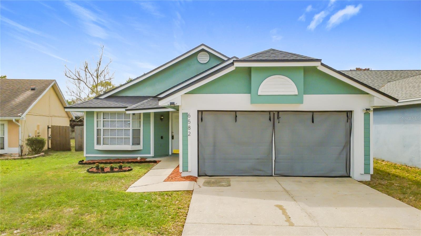 Foto de propiedad en 6582 MERITMOOR CIR ORLANDO con MLS# O6390894