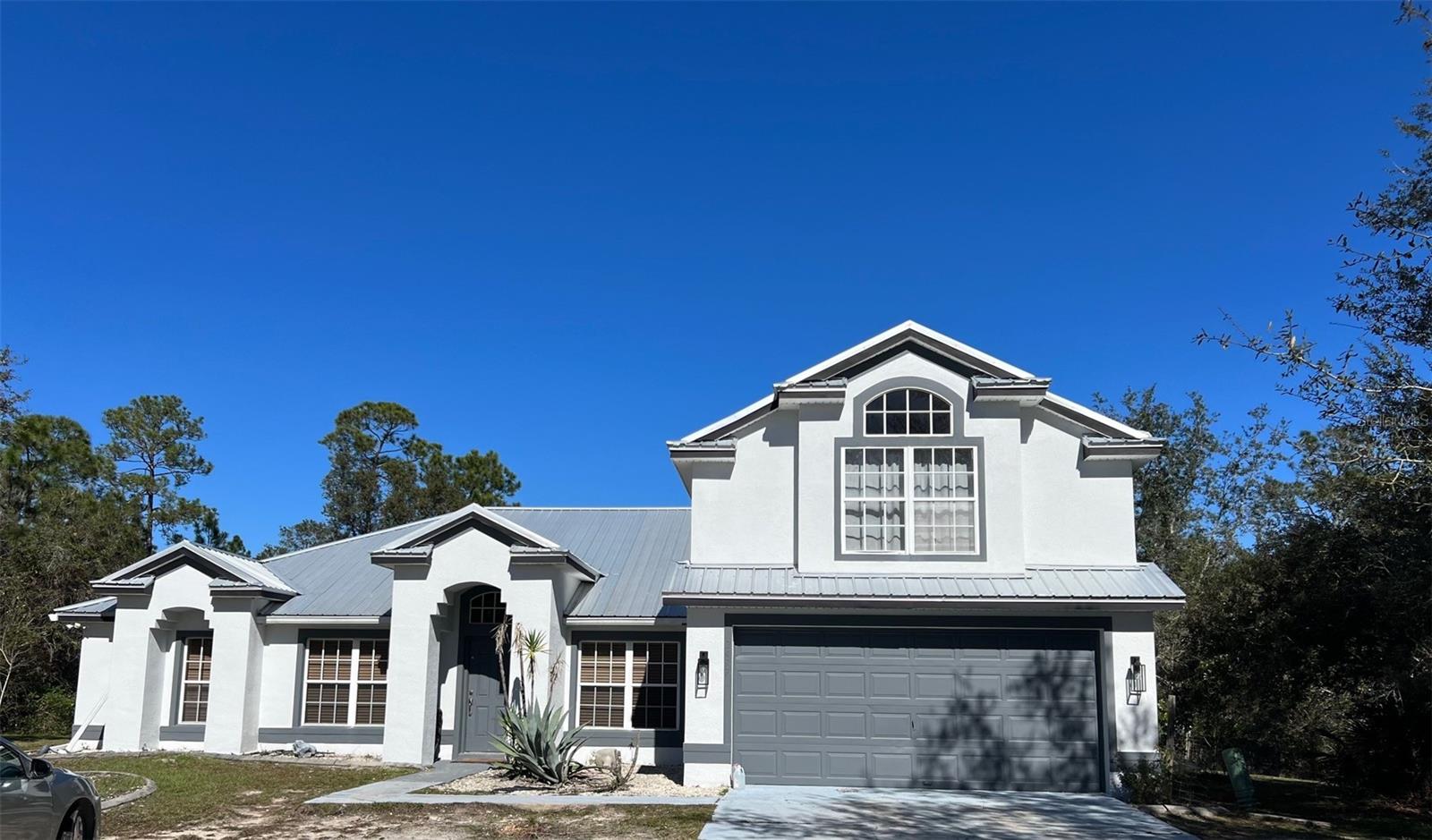 Foto de propiedad en 2477 THACKER TRL KISSIMMEE con MLS# O6395094