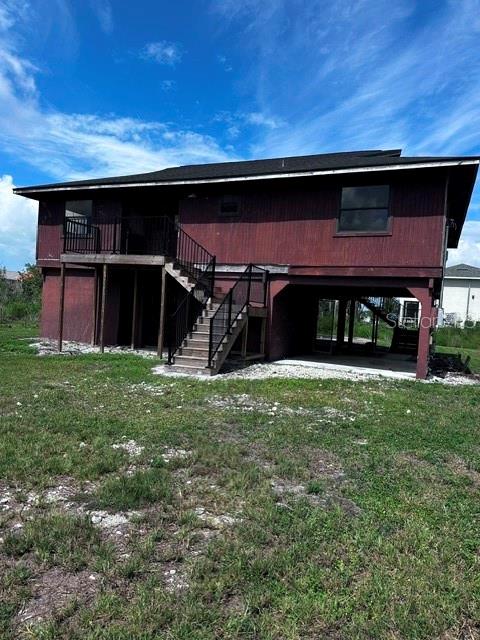 Foto de propiedad en 16540 WISTERIA DR FORT MYERS con MLS# O6396587