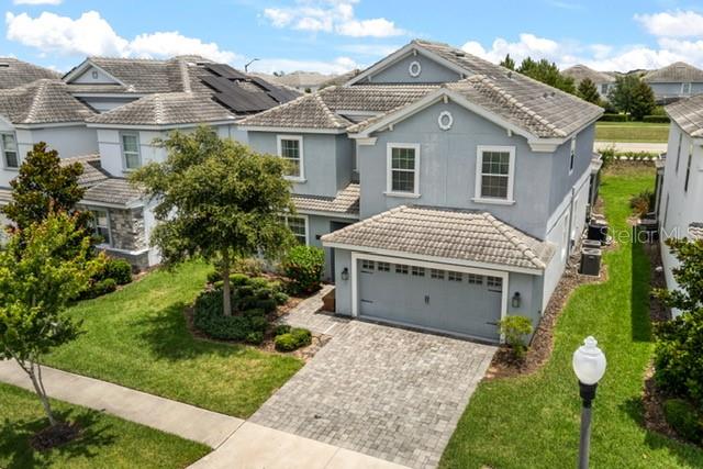 Foto de propiedad en 8909 STINGER DR CHAMPIONS GATE con MLS# O6402178