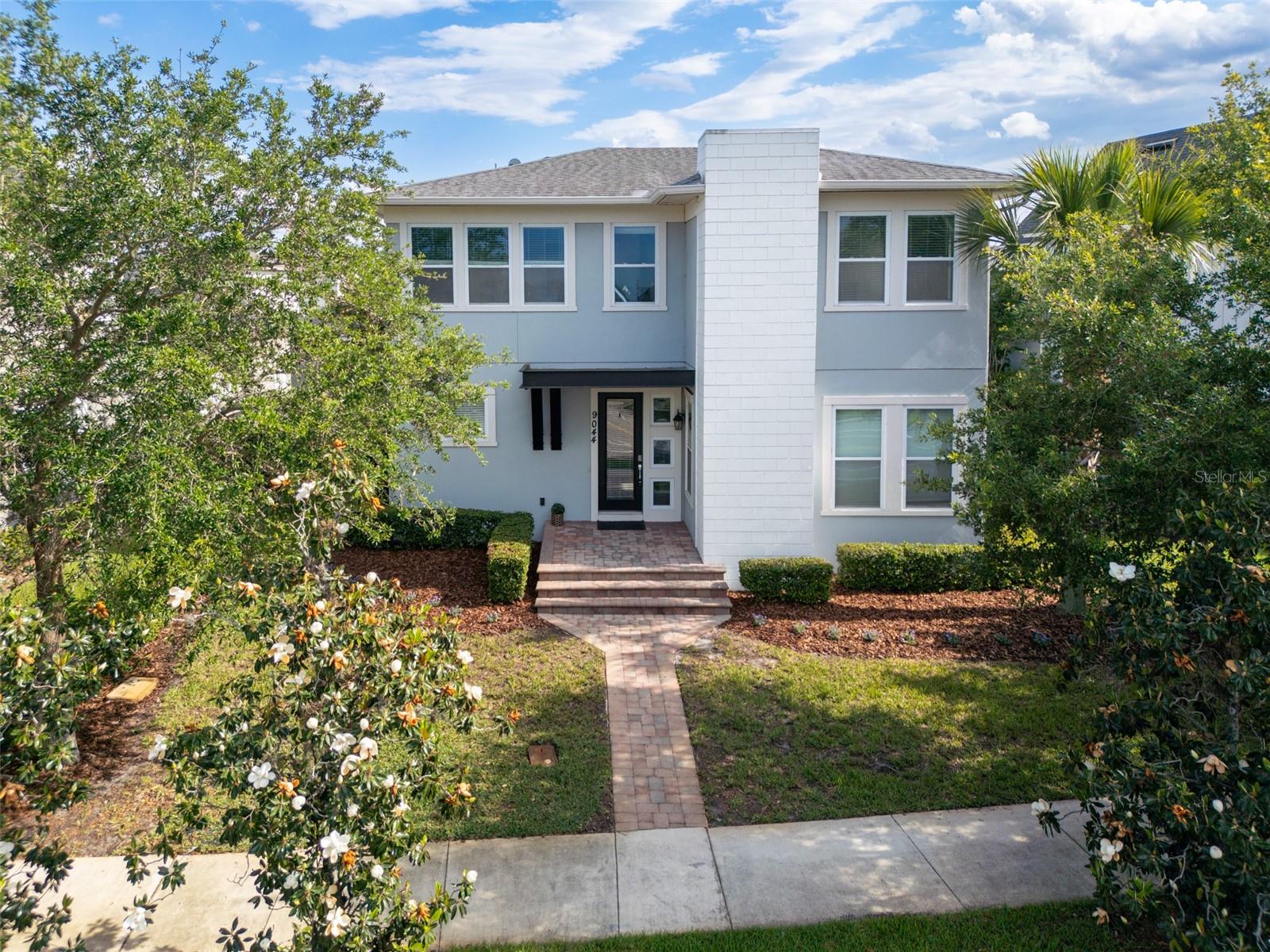 Foto de propiedad en 9044 TAVISTOCK LAKES BLVD ORLANDO con MLS# O6402945