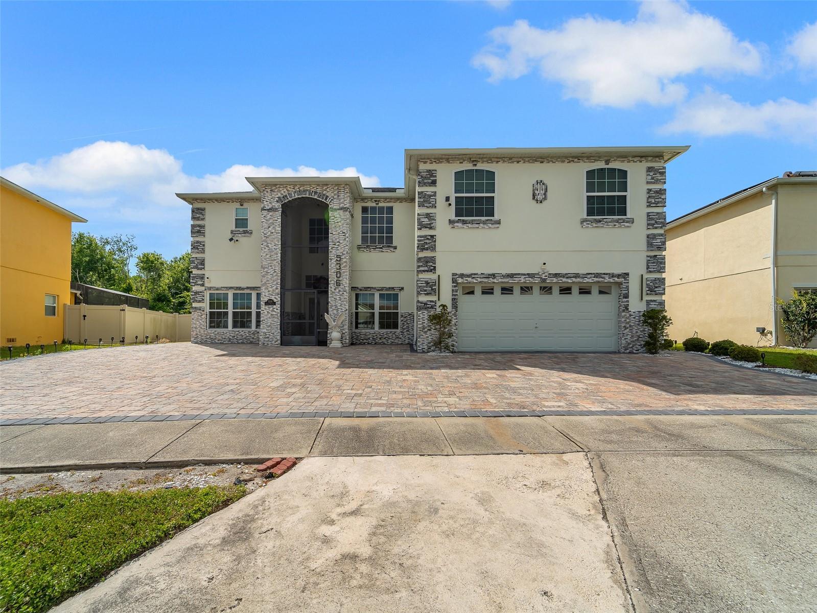 Foto de propiedad en 5306 CORAL VINE LN KISSIMMEE con MLS# O6405097