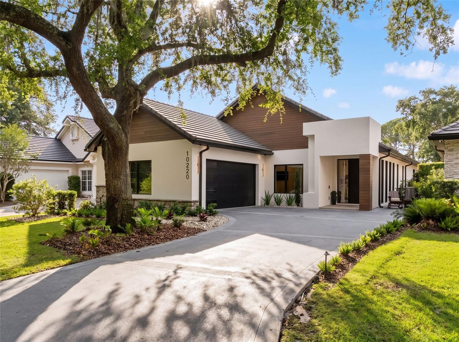 Foto de propiedad en 10220 CHILTERN GARDEN DR ORLANDO con MLS# O6409134