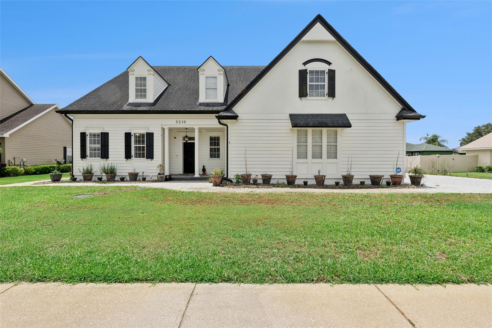 Foto de propiedad en 5210 HAMMOCK CIR ST CLOUD con MLS# O6409148