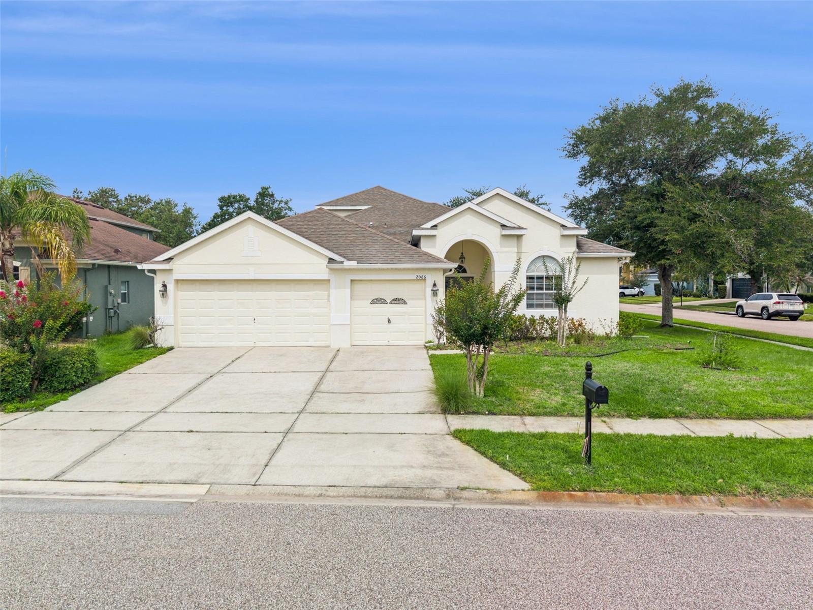 Front of home with 3-car garage