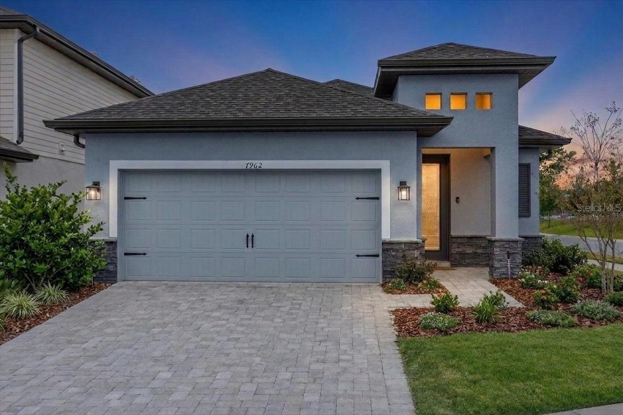 Foto de propiedad en 7962 RUMNEY LN REUNION con MLS# O6414237