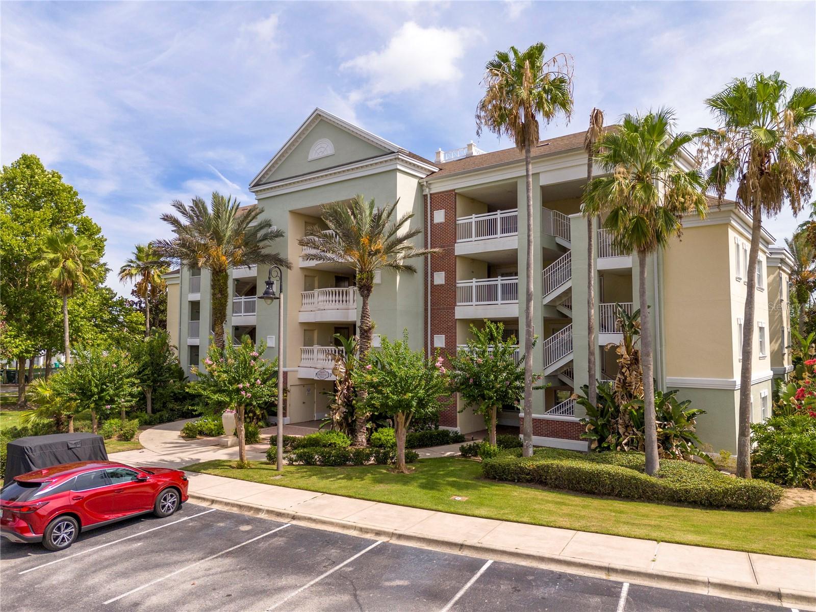 Foto de propiedad en 7659 WHISPER WAY #304 REUNION con MLS# O6417591