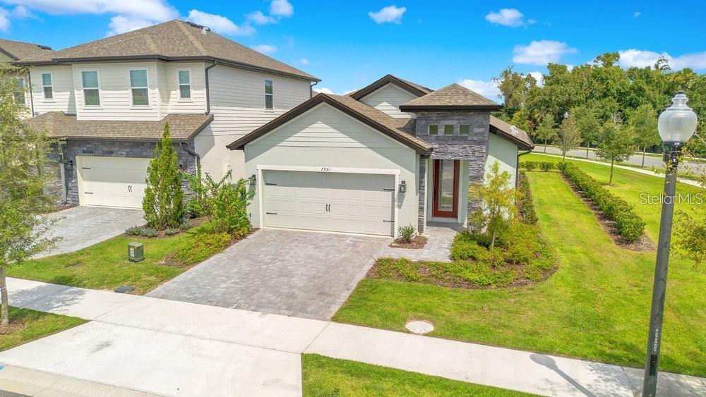 Foto de propiedad en 7951 RUMNEY LN REUNION con MLS# O6418084