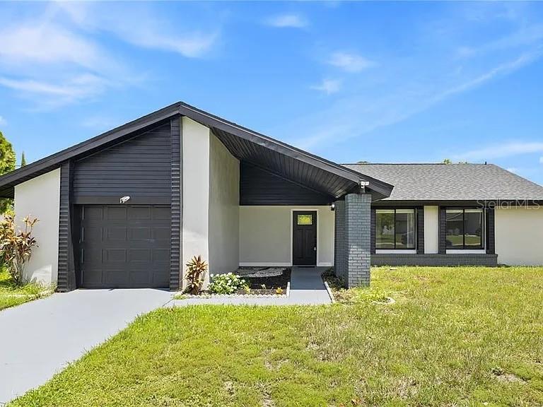Foto de propiedad en 17 S FLAG CT KISSIMMEE con MLS# O6418950