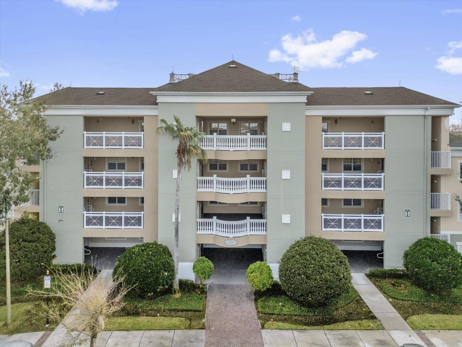 Foto de propiedad en 1364 CENTRE COURT RIDGE DR #101 REUNION con MLS# O6420774