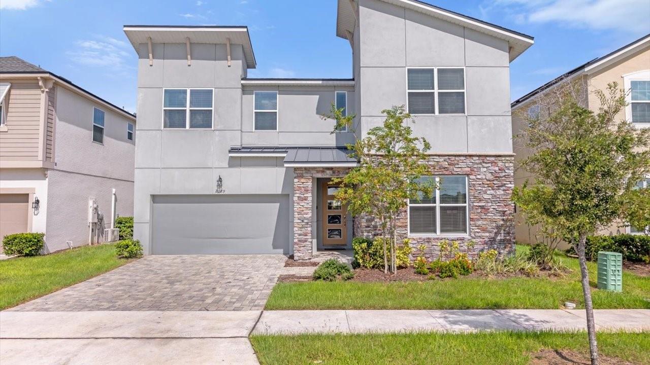 Foto de propiedad en 2089 TROPICAL PALMS CIR KISSIMMEE con MLS# O6425706
