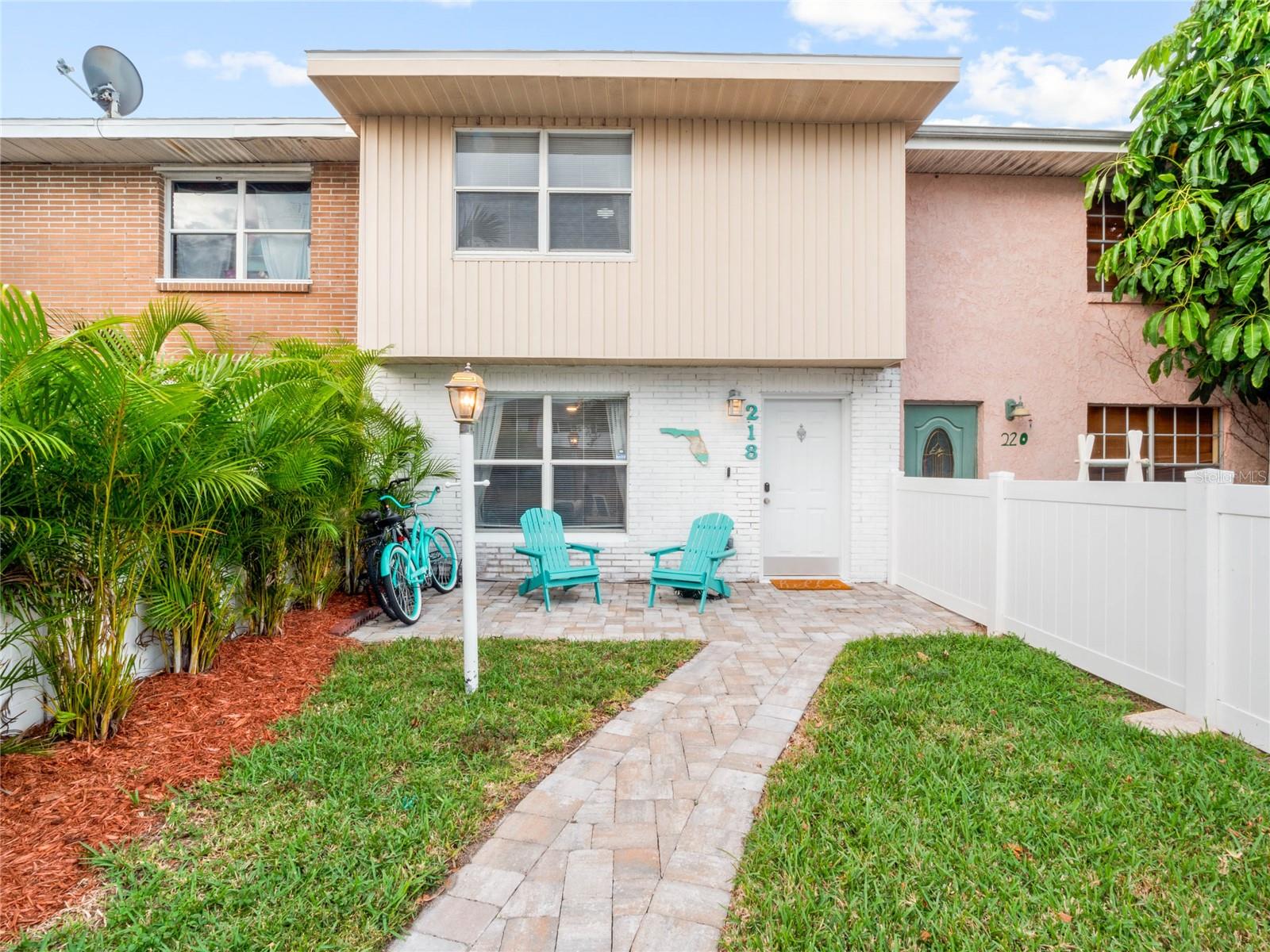 Welcome to 218 Canaveral Beach Blvd, a beautifully maintained coastal townhome in the heart of Cape Canaveral.