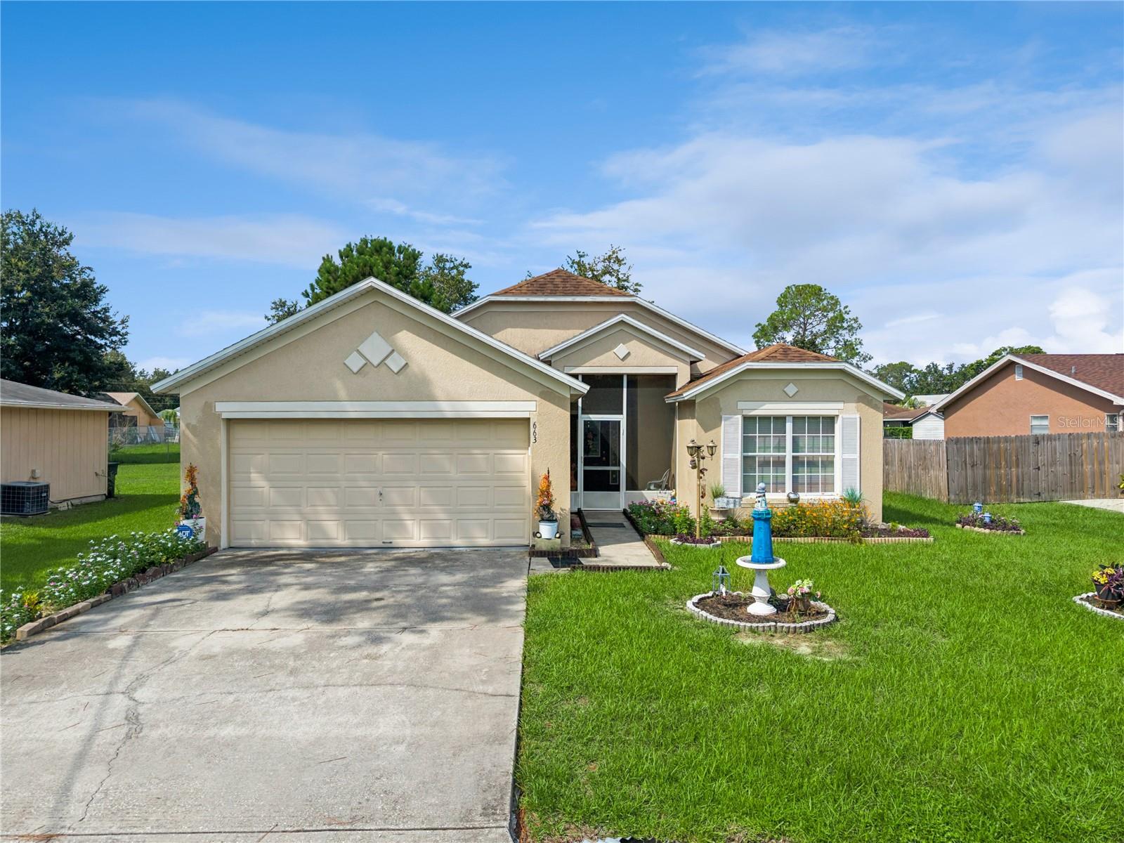Foto de propiedad en 663 MESILLA DR KISSIMMEE con MLS# O6428313