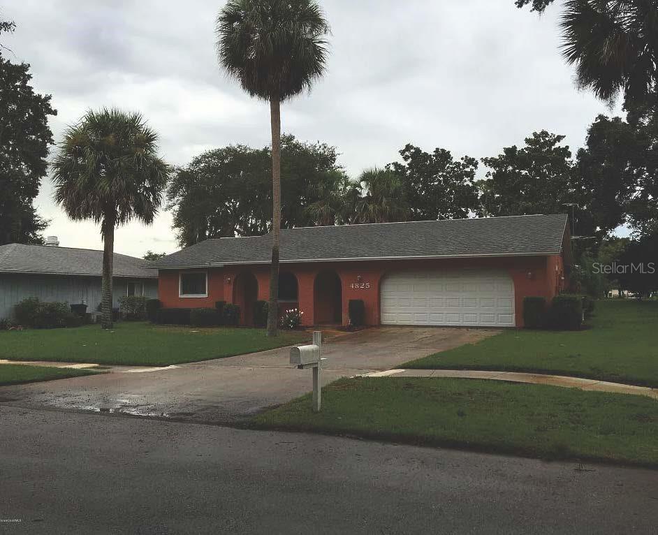 Foto de propiedad en 4825 SQUIRES DR TITUSVILLE con MLS# O6429764