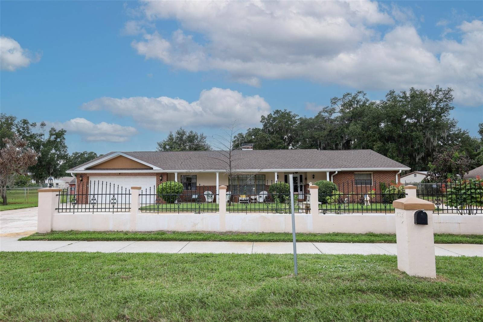 Front with circular driveway.