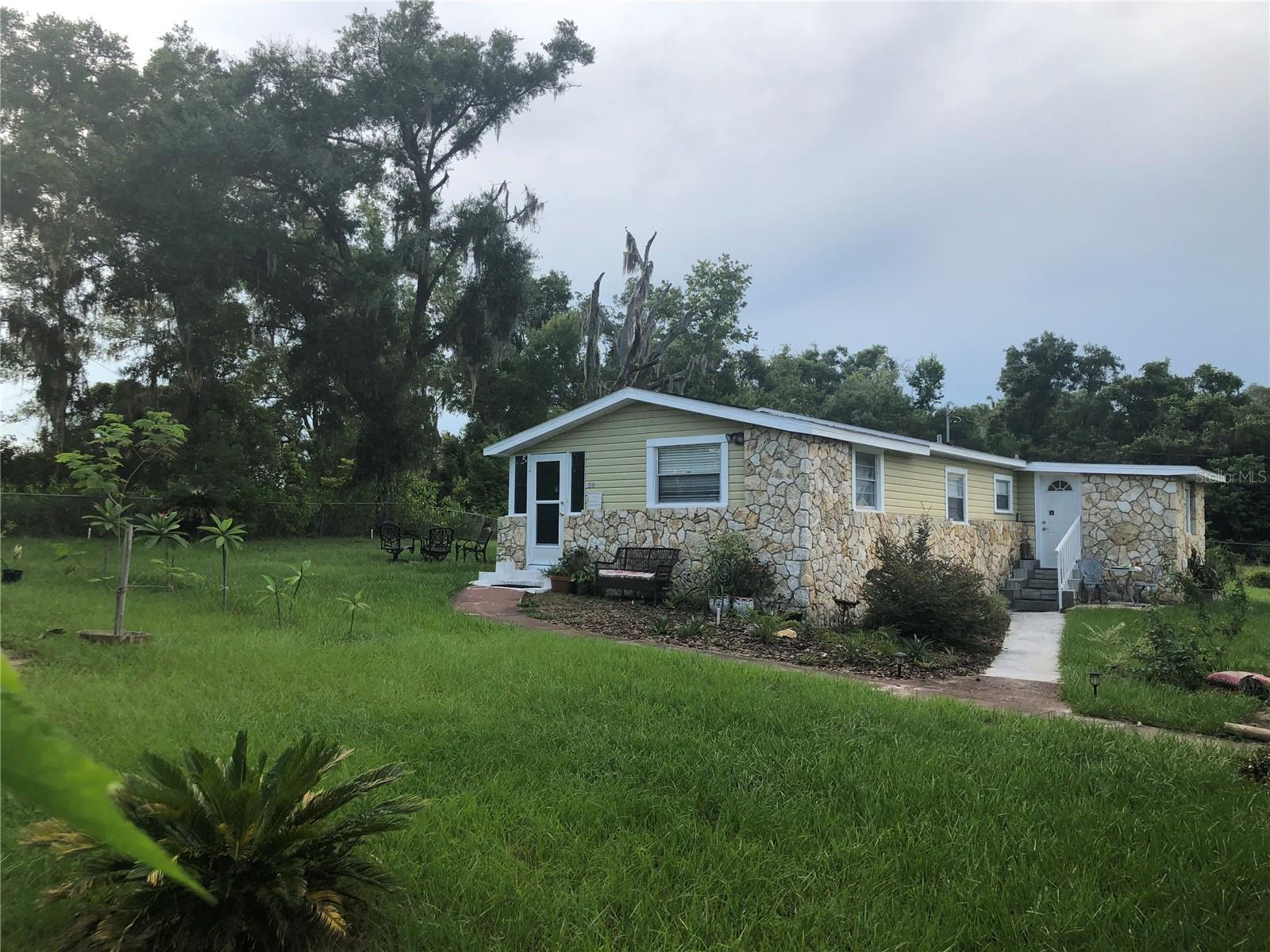 Foto de propiedad en 405 W SIMON AVE APOPKA con MLS# O6430111