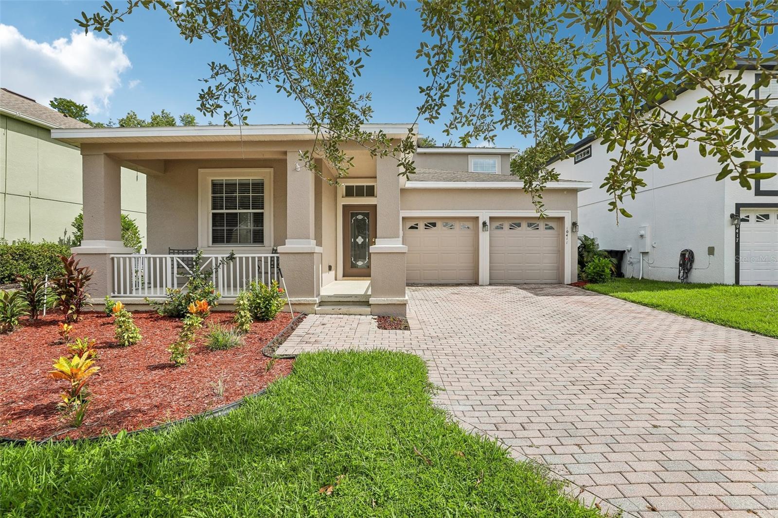 Set on a CONSERVATION LOT with peaceful WOODED VIEWS, this spacious two-story home offers 5 bedrooms, 3.5 baths, a desirable MAIN-FLOOR PRIMARY SUITE and a FULLY FENCED BACKYARD in the sought-after EAST PARK community of Lake Nona!