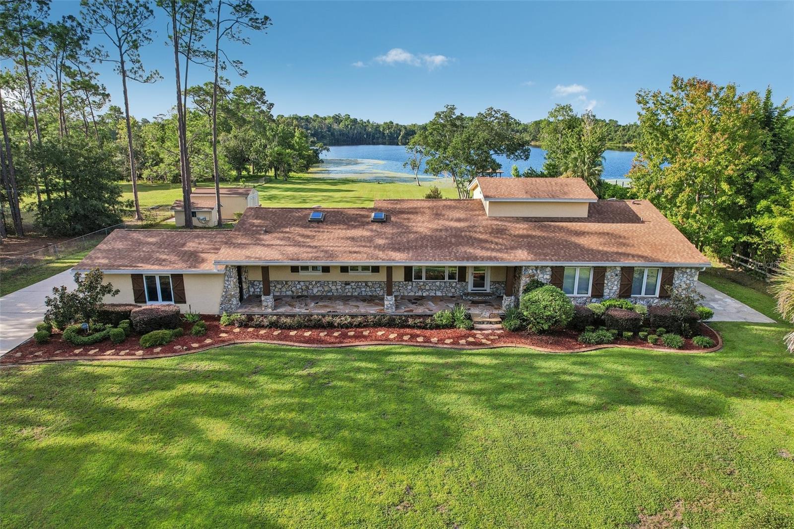 Welcome to this stunning CUSTOM-BUILT 3-Bedroom, 3-Bath single-story home offering a rare combination of space, privacy, BEAUTIFUL CRAFTSMANSHIP and direct access to SKIABLE LAKE KEHOE, complete with your own PRIVATE DOCK.