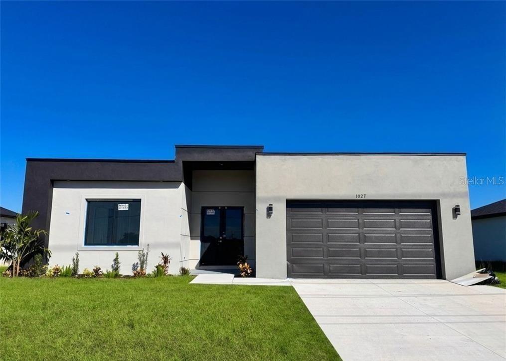 Foto de propiedad en 1027 KISMET PKWY W CAPE CORAL con MLS# O6437430