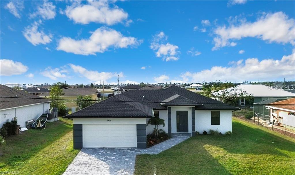 Foto de propiedad en 1436 NW 31ST AVE CAPE CORAL con MLS# OM718773
