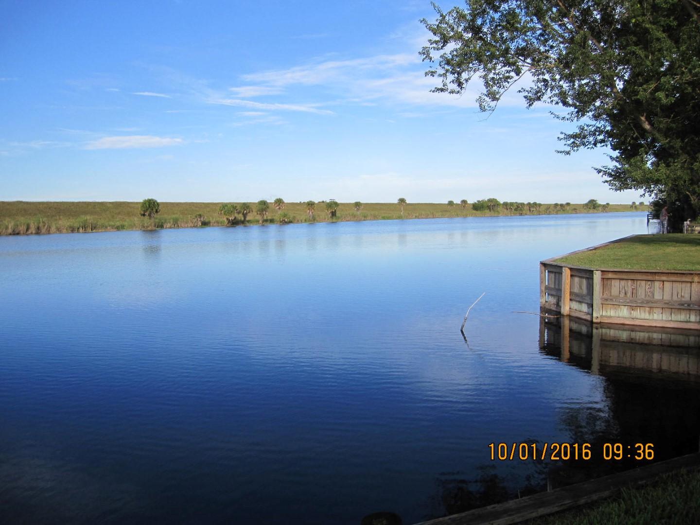 Foto de propiedad en 8101 SE 99th Trail, Okeechobee, FL 34974 Okeechobee con MLS# 