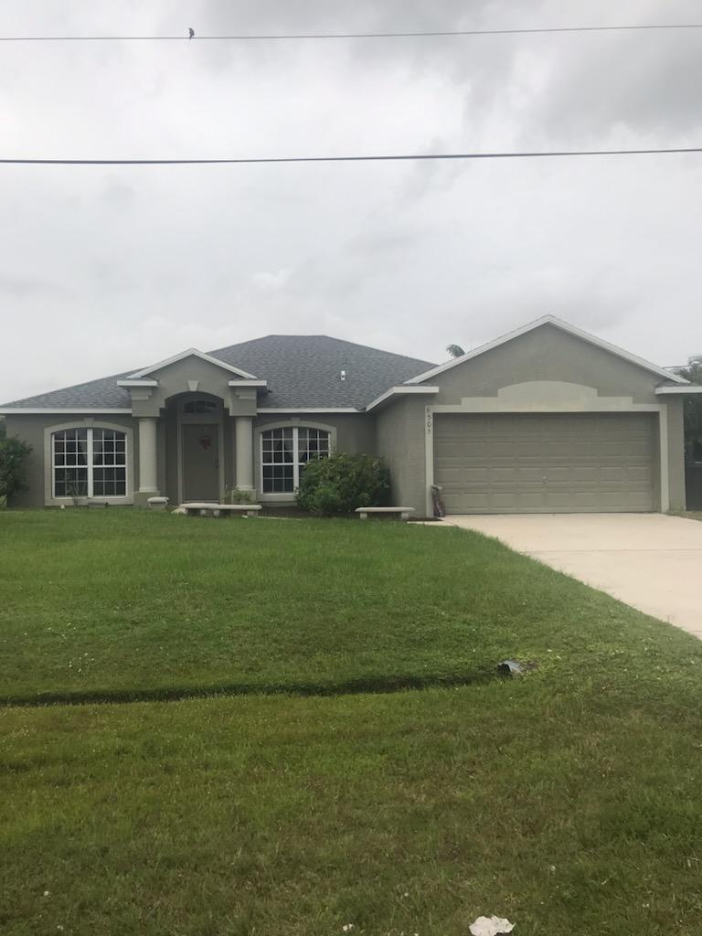 Foto de propiedad en 6305 NW Hala Court, Port St. Lucie, FL 34983 Port St. Lucie con MLS# 