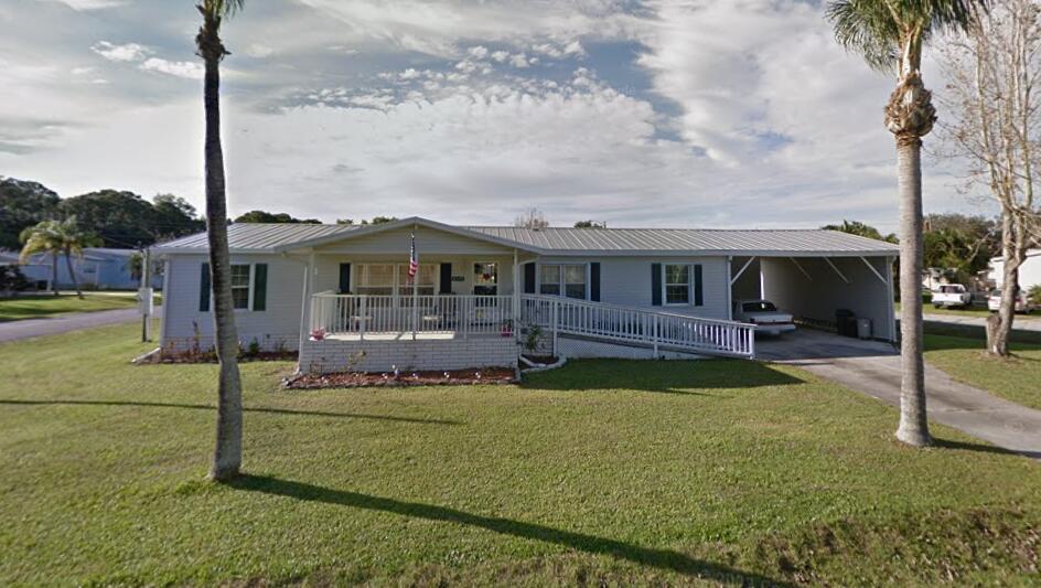 Foto de propiedad en 6325 SE Colonial Drive, Stuart, FL 34997 Stuart con MLS# 