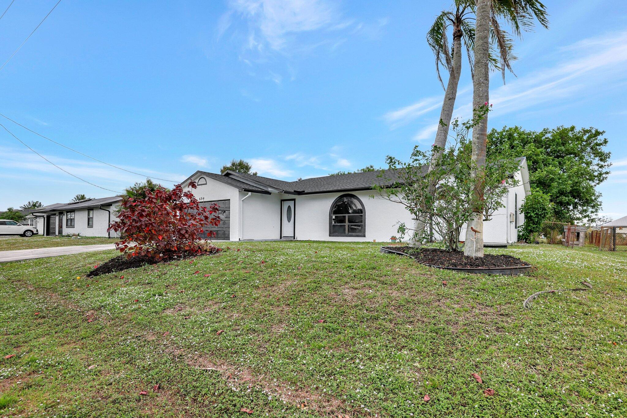 Foto de propiedad en 654 SW Pueblo Terrace, Port St. Lucie, FL 34953 Port St. Lucie con MLS# 